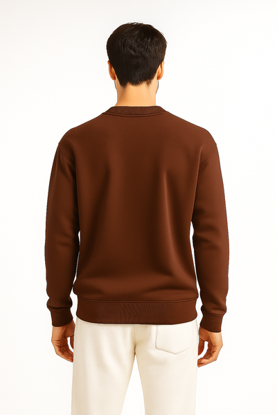 Man wearing a brown sweatshirt back profile