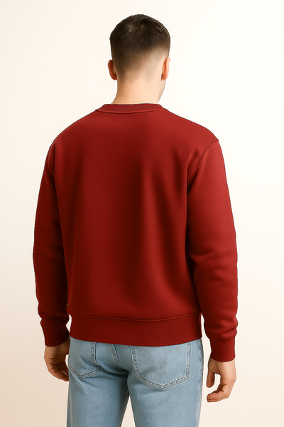 Back profile of Red sweatshirt and light blue jeans.