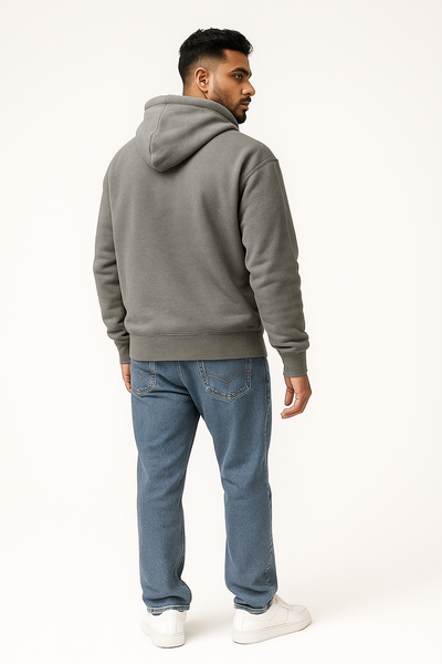 Man wearing a gray hoodie