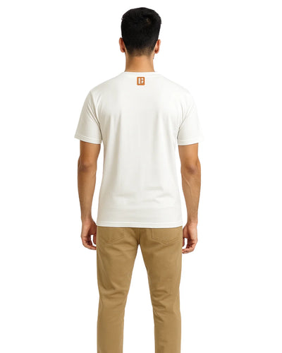 Man wearing a white t-shirt with a logo on the back, standing against a white background