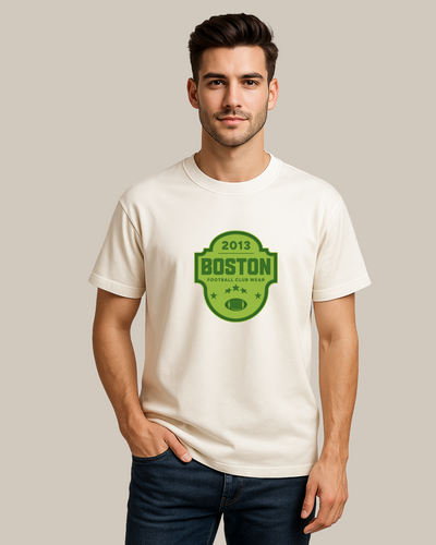 Man wearing a white t-shirt with a green 'Boston' logo.