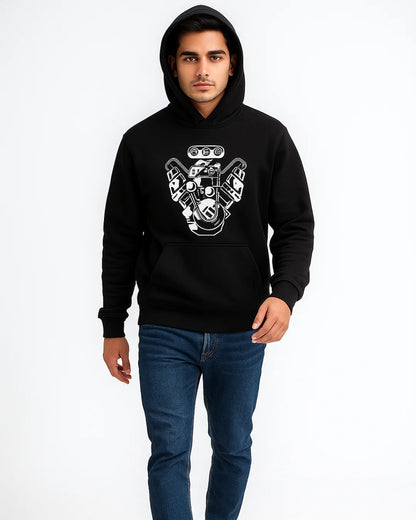 Person wearing a BarelyStylish black hoodie with graphic design.