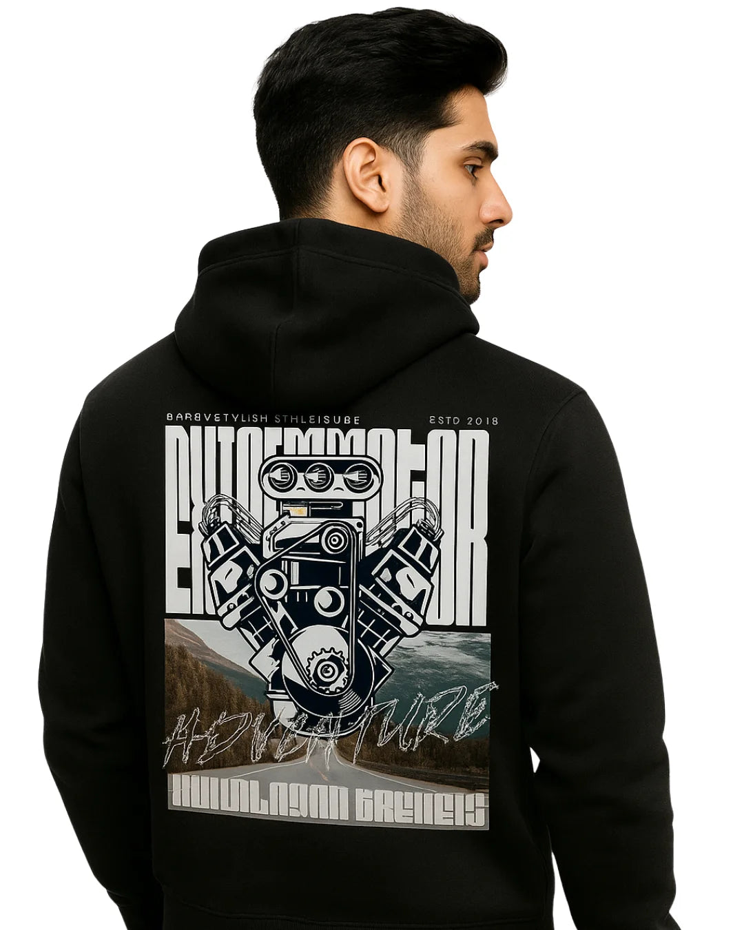 Man wearing a black hoodie with a detailed graphic design on the back against a white background