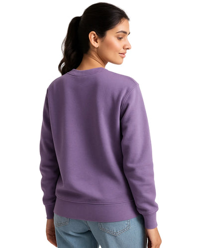 Person wearing a purple sweatshirt on a white background