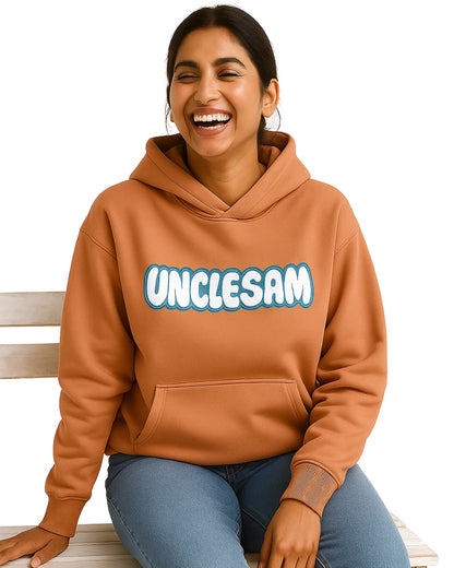 Women wearing a light orange hoodie with 'UNCLESAM'.