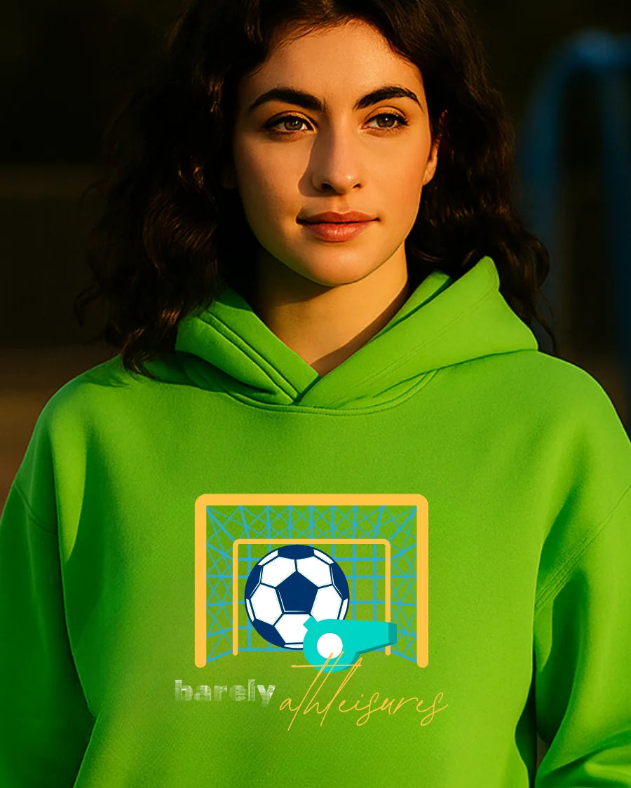 Women wearing a green hoodie with a soccer design and text.