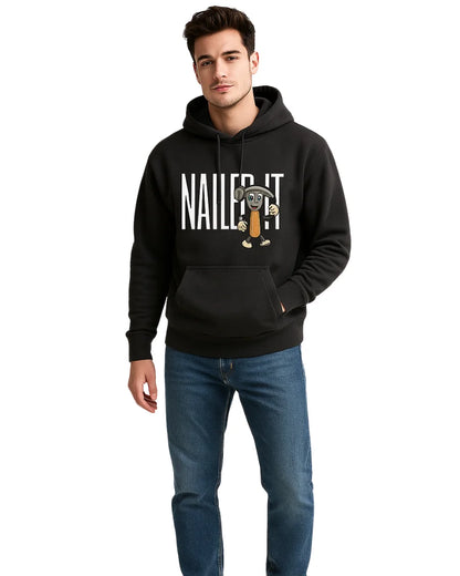 Man wearing a black hoodie with 'Nailed It'.