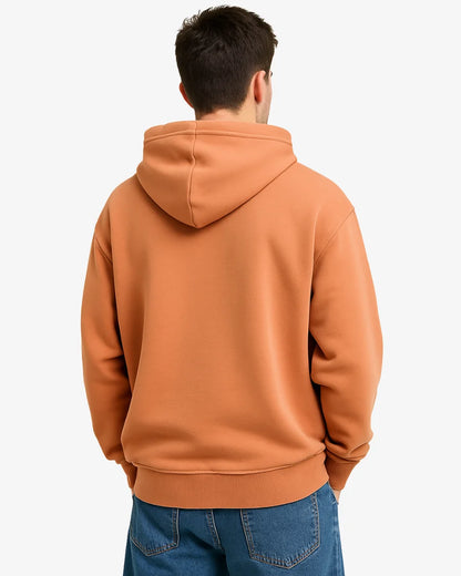 Back Profile of Man wearing a brownish Orange hoodie with a BarelyStylish logo