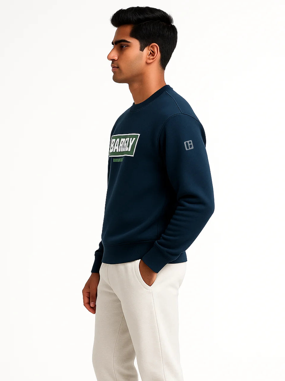 Man wearing a navy blue sweatshirt with a logo on a white background