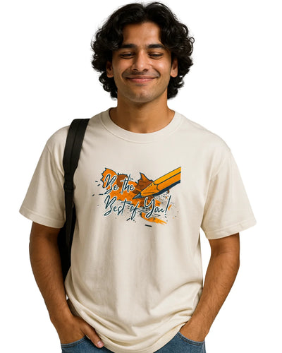 Person wearing a beige t-shirt with a motivational quote and graphic design.