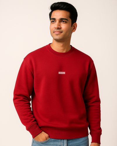 Man wearing a red sweatshirt with a logo