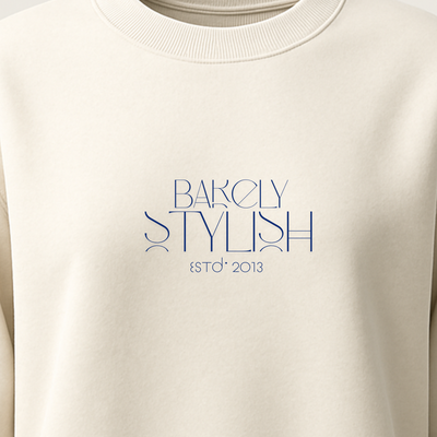 Beige sweatshirt with 'Barely Stylish' logo